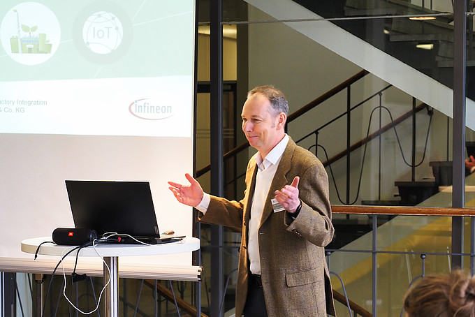 Dr. Germar Schneider, Senior Manager Factory Integration at Infineon Technologies Dresden GmbH, during his keynote speech